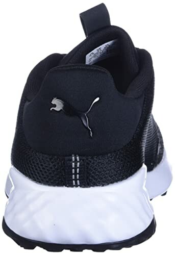 Back view of black Puma sneaker